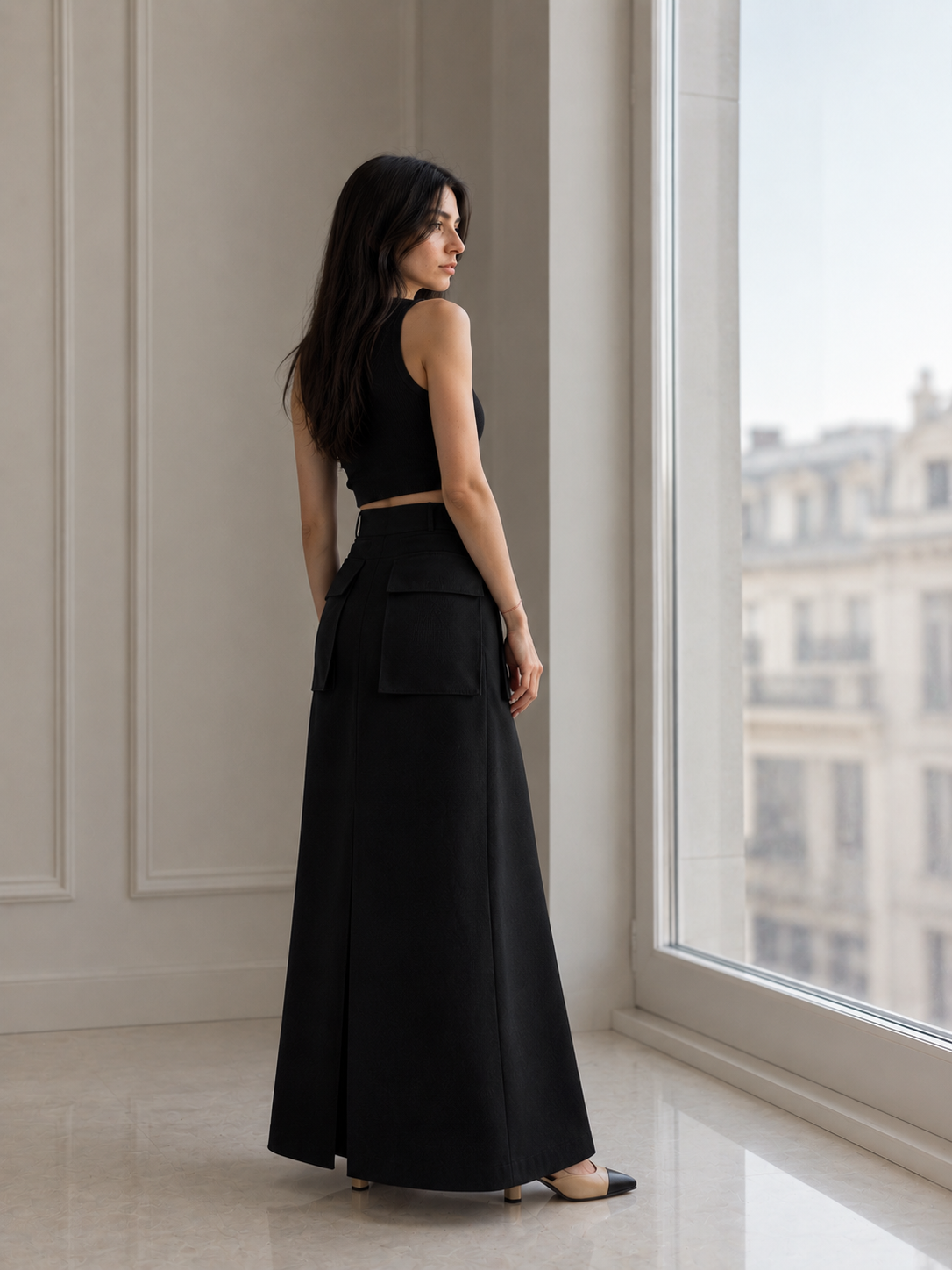 AI fashion frame: back view of the black tank and maxi skirt look