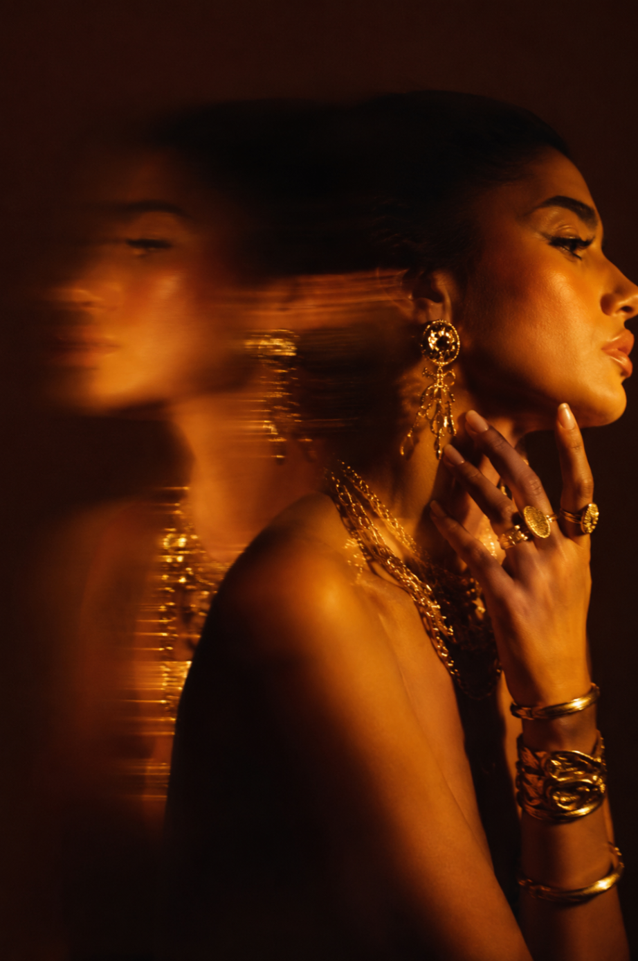 AI portrait: double-exposure golden profile with statement earrings